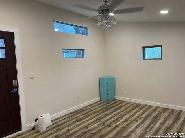 2319 Cascada, Spring Branch, TX 78070 - spare room featuring ceiling fan, dark wood-style floors, baseboards, plenty of natural light, and recessed lighting