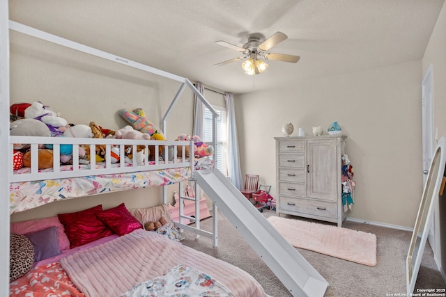 160 Jolie, Boerne, TX 78015 - bedroom featuring carpet flooring, ceiling fan, and baseboards