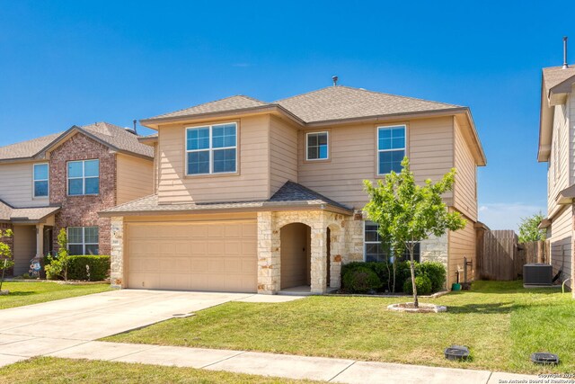 160 Jolie, Boerne, TX 78015 - view of front facade with driveway, roof with shingles, an attached garage, stone siding, and central air condition unit