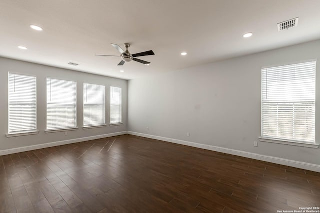 19146 Mcconnell Rd, Atascosa, TX 78002 - spare room with a ceiling fan, baseboards, recessed lighting, and dark wood-style flooring