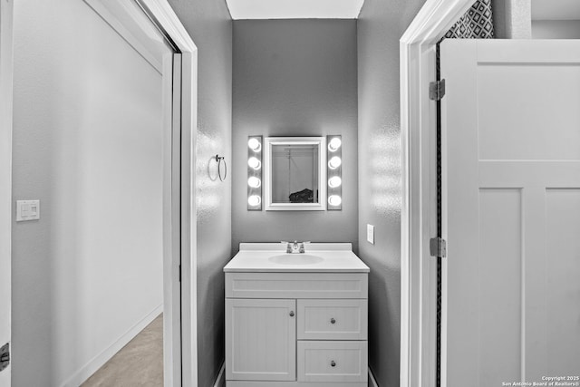 764 Zuehl Xing, La Vernia, TX 78121 - bathroom featuring vanity and a textured wall