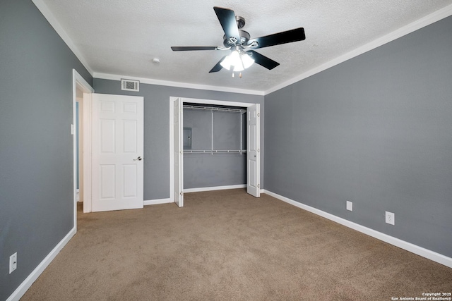 3243 Nacogdoches Rd Unit 501, San Antonio, TX 78217 - unfurnished bedroom featuring carpet floors, baseboards, a closet, a textured ceiling, and ceiling fan