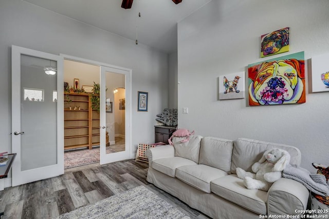 6511 Tallow Way, Converse, TX 78109 - living room featuring french doors, wood finished floors, ceiling fan, and arched walkways