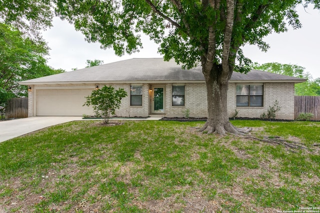 4231 Misty Glade, San Antonio, TX 78247 - single story home with an attached garage, brick siding, and concrete driveway