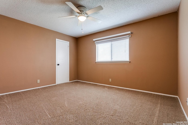 4231 Misty Glade, San Antonio, TX 78247 - carpeted empty room featuring a ceiling fan, baseboards, and a textured ceiling