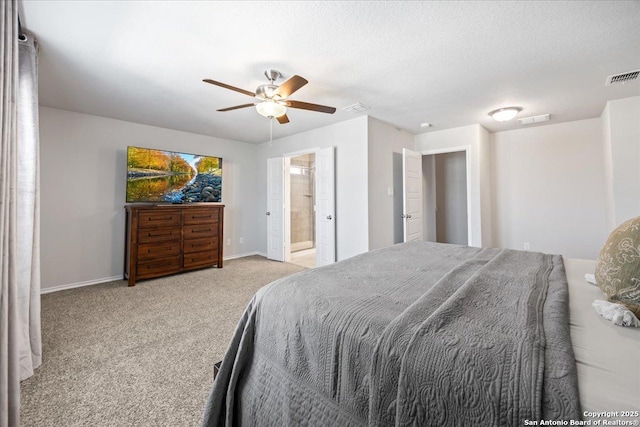 140 Whitetail Pass, San Antonio, TX 78253 - bedroom with carpet, baseboards, ceiling fan, and connected bathroom