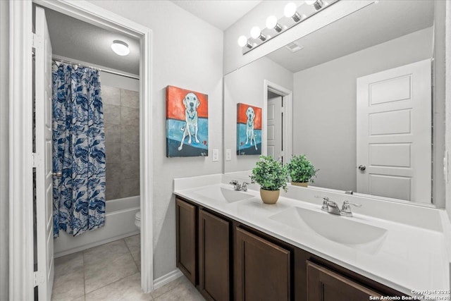 140 Whitetail Pass, San Antonio, TX 78253 - full bathroom with tile patterned floors, double vanity, toilet, shower / bath combination with curtain, and baseboards