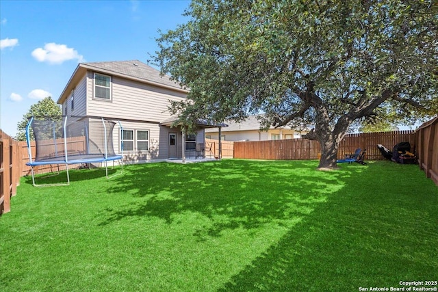 140 Whitetail Pass, San Antonio, TX 78253 - back of house featuring a trampoline and a patio