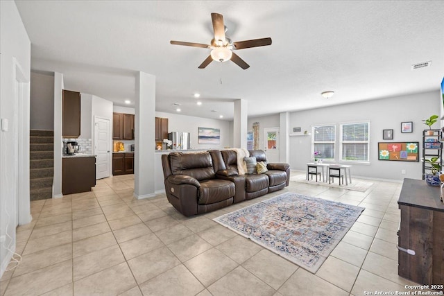 140 Whitetail Pass, San Antonio, TX 78253 - living area featuring light tile patterned floors, ceiling fan, stairway, and recessed lighting
