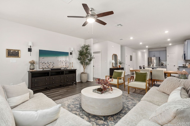 10227 Amaryllis, Boerne, TX 78006 - living area with wood finished floors, a ceiling fan, and recessed lighting