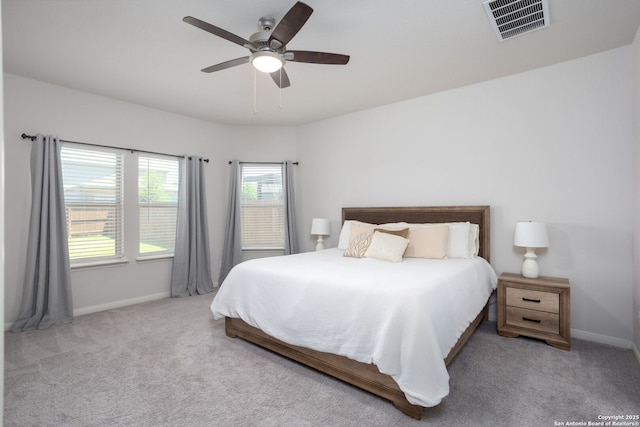 10227 Amaryllis, Boerne, TX 78006 - carpeted bedroom with baseboards and ceiling fan