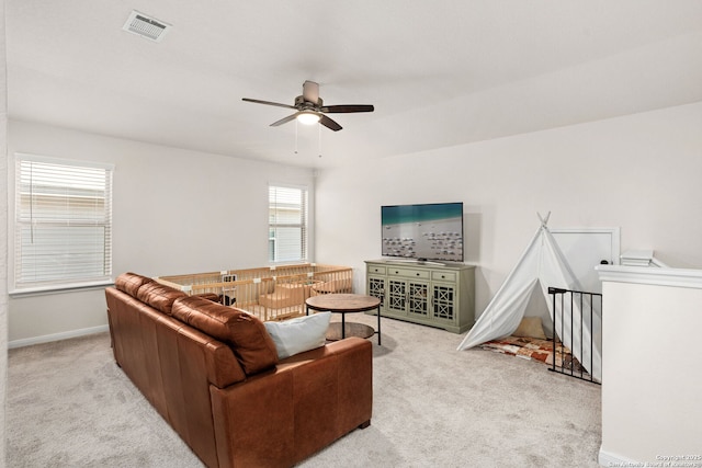 10227 Amaryllis, Boerne, TX 78006 - living area with carpet floors, ceiling fan, and baseboards
