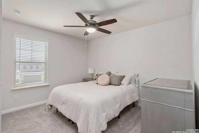 10227 Amaryllis, Boerne, TX 78006 - bedroom featuring baseboards, carpet flooring, and ceiling fan