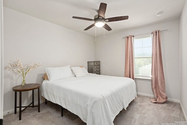 10227 Amaryllis, Boerne, TX 78006 - bedroom featuring carpet, baseboards, and a ceiling fan