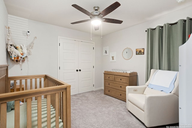 10227 Amaryllis, Boerne, TX 78006 - carpeted bedroom featuring a closet, ceiling fan, and a nursery area