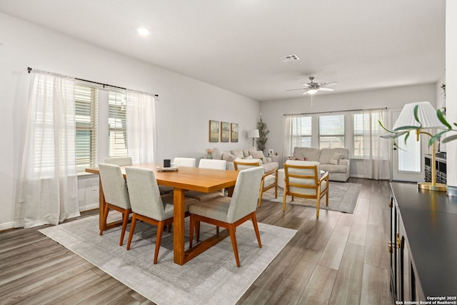 10227 Amaryllis, Boerne, TX 78006 - dining room featuring ceiling fan, wood finished floors, and recessed lighting