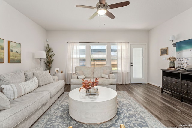 10227 Amaryllis, Boerne, TX 78006 - living room with wood finished floors, a ceiling fan, and baseboards