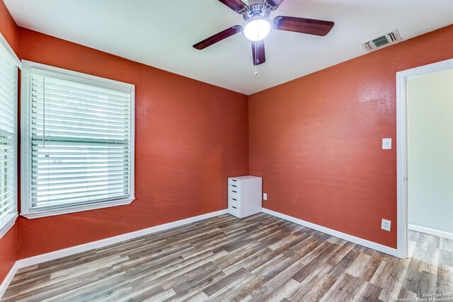 466 Shannon Lee, San Antonio, TX 78216 - empty room featuring wood finished floors, a ceiling fan, and baseboards