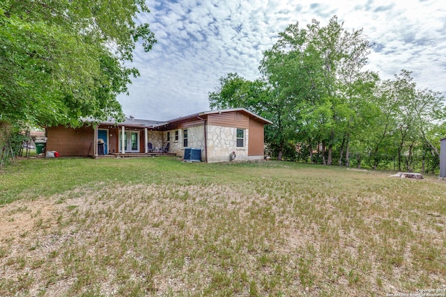 466 Shannon Lee, San Antonio, TX 78216 - view of green lawn featuring central AC and covered porch