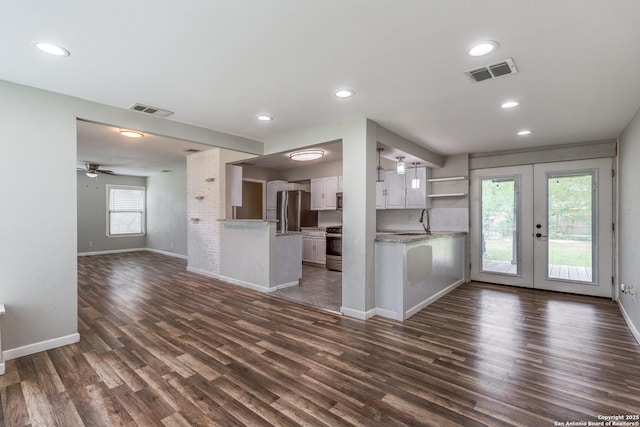 466 Shannon Lee, San Antonio, TX 78216 - unfurnished living room featuring dark wood finished floors, a sink, baseboards, french doors, and ceiling fan