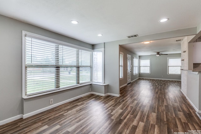 466 Shannon Lee, San Antonio, TX 78216 - unfurnished living room with dark wood finished floors, baseboards, ceiling fan, and recessed lighting