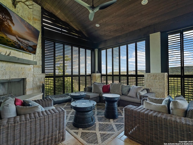 21214 W Tejas Trl, San Antonio, TX 78257 - living room with wood ceiling, ceiling fan, an outdoor stone fireplace, and high vaulted ceiling