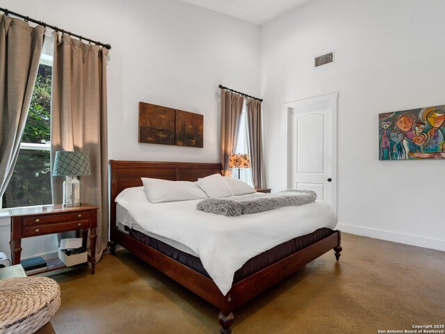 21214 W Tejas Trl, San Antonio, TX 78257 - carpeted bedroom with baseboards and a high ceiling