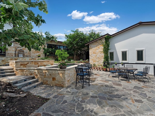 21214 W Tejas Trl, San Antonio, TX 78257 - view of patio featuring outdoor dining area