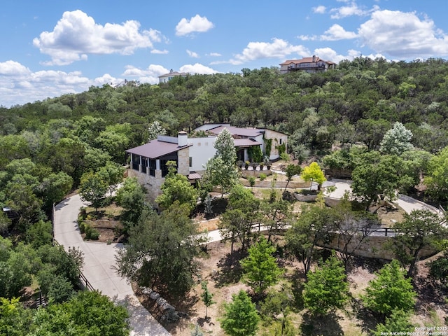 21214 W Tejas Trl, San Antonio, TX 78257 - aerial view of property and surrounding area with a heavily wooded area