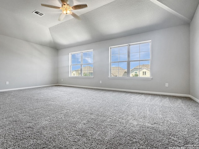 9536 Garrison Way, San Antonio, TX 78254 - carpeted empty room featuring a ceiling fan, baseboards, lofted ceiling, and a textured ceiling