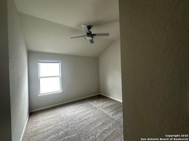 9536 Garrison Way, San Antonio, TX 78254 - unfurnished room with carpet floors, ceiling fan, baseboards, and lofted ceiling