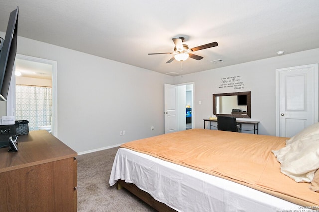 bedroom with carpet flooring, baseboards, and a ceiling fan