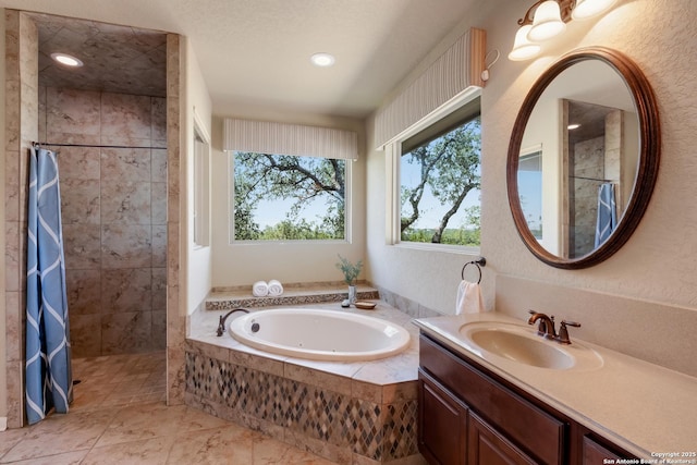 25838 Echo Mtn, San Antonio, TX 78260 - bathroom with a tile shower, a jetted tub, vanity, and tile patterned flooring