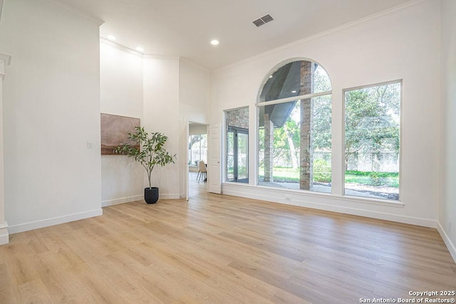17338 Fountain Mist, San Antonio, TX 78248 - empty room featuring crown molding, baseboards, light wood-style flooring, and recessed lighting