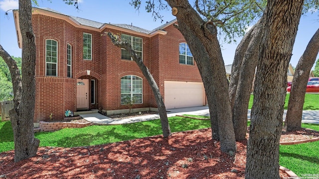 8818 Ash Mdw, Universal City, TX 78148 - view of front of property with brick siding, a garage, and concrete driveway