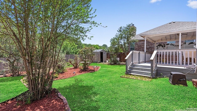 8818 Ash Mdw, Universal City, TX 78148 - view of yard with a storage shed, a wooden deck, an outbuilding, and ceiling fan