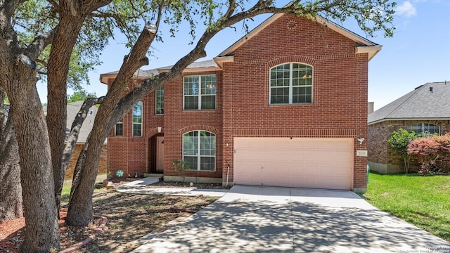 8818 Ash Mdw, Universal City, TX 78148 - traditional-style home with brick siding, concrete driveway, and an attached garage