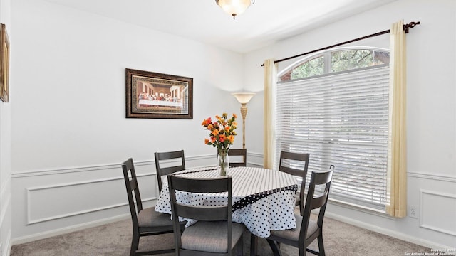 8818 Ash Mdw, Universal City, TX 78148 - carpeted dining room with baseboards