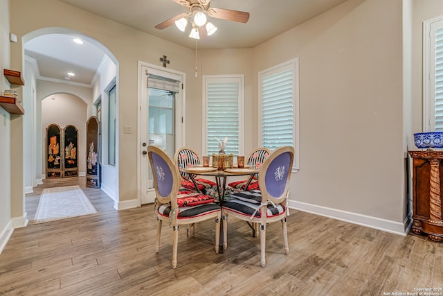 1414 W Bitters # 3, San Antonio, TX 78248 - dining room featuring arched walkways, ceiling fan, light wood-style floors, and baseboards