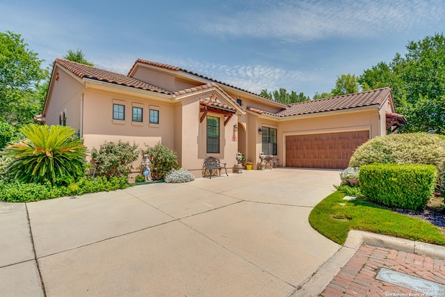 1414 W Bitters # 3, San Antonio, TX 78248 - mediterranean / spanish house featuring a garage, a tile roof, driveway, and stucco siding
