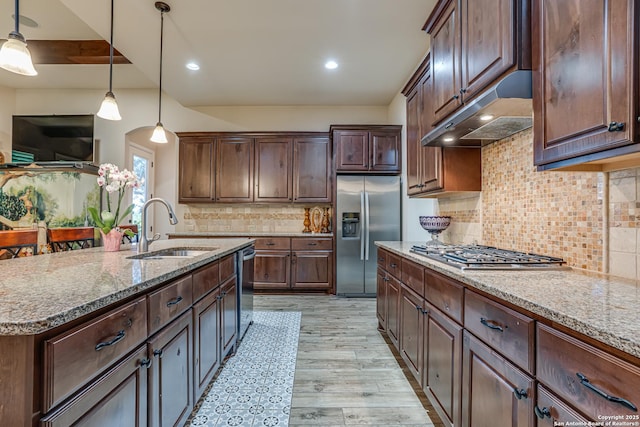 1414 W Bitters # 3, San Antonio, TX 78248 - kitchen with stainless steel appliances, under cabinet range hood, a sink, light stone countertops, and recessed lighting