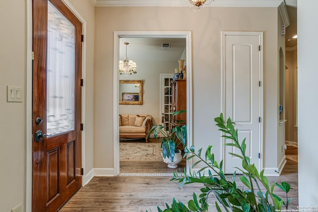 1414 W Bitters # 3, San Antonio, TX 78248 - foyer featuring a chandelier, wood finished floors, baseboards, and ornamental molding