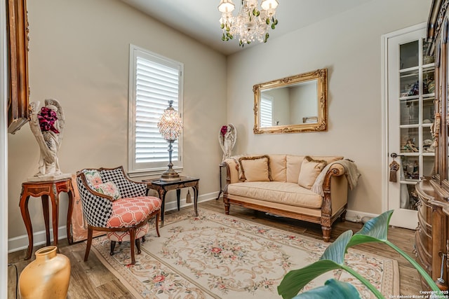 1414 W Bitters # 3, San Antonio, TX 78248 - living area featuring a chandelier, wood finished floors, and baseboards