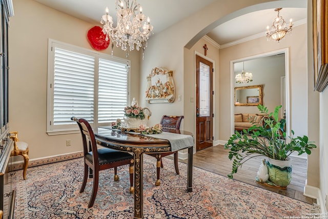 1414 W Bitters # 3, San Antonio, TX 78248 - dining area featuring a chandelier, arched walkways, baseboards, ornamental molding, and wood finished floors