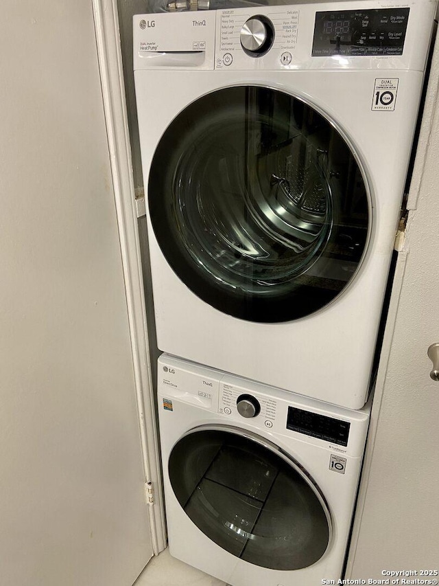 4803 Hamilton Wolfe Rd, San Antonio, TX 78229 - laundry room with stacked washer / drying machine
