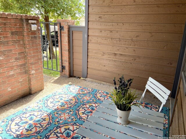 4803 Hamilton Wolfe Rd, San Antonio, TX 78229 - view of patio with a gate and fence