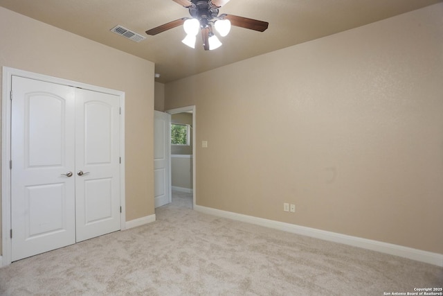 12302 Calvert, Helotes, TX 78023 - unfurnished bedroom featuring carpet, baseboards, a closet, and ceiling fan