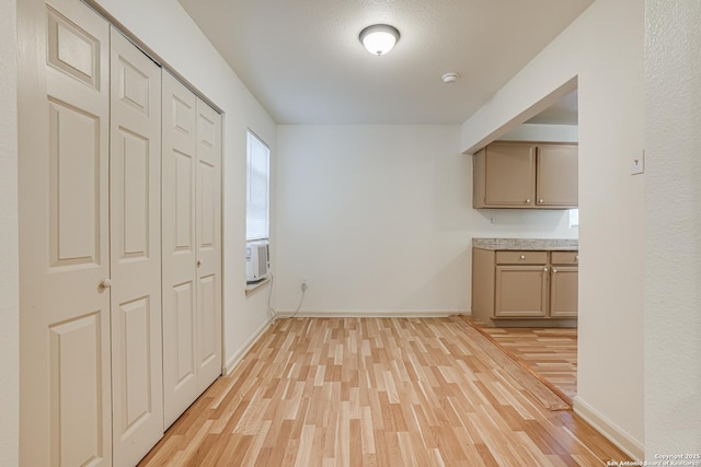 318 Elks, San Antonio, TX 78211 - kitchen featuring light wood-style floors, light countertops, and baseboards