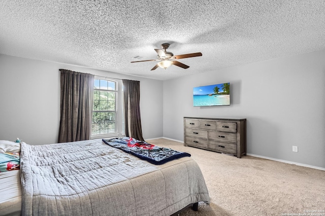 4838 Corian Spgs, San Antonio, TX 78247 - bedroom with carpet, ceiling fan, baseboards, and a textured ceiling