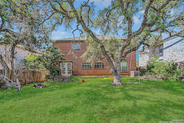 4838 Corian Spgs, San Antonio, TX 78247 - back of house featuring french doors, brick siding, and central AC